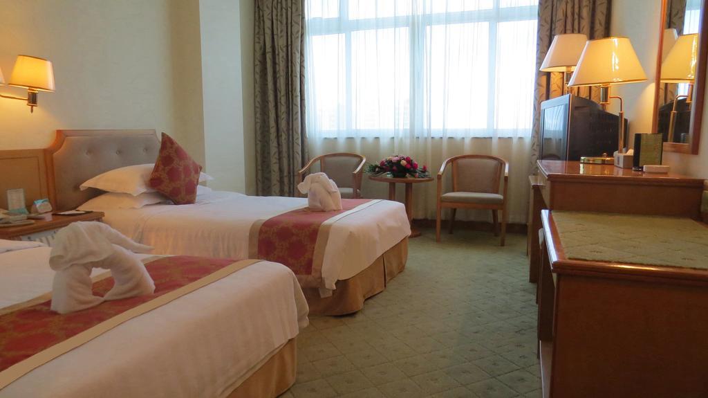 Guoxi Hotel Саня Стая снимка