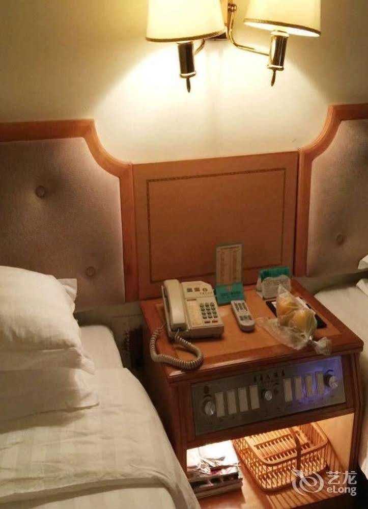 Guoxi Hotel Саня Екстериор снимка